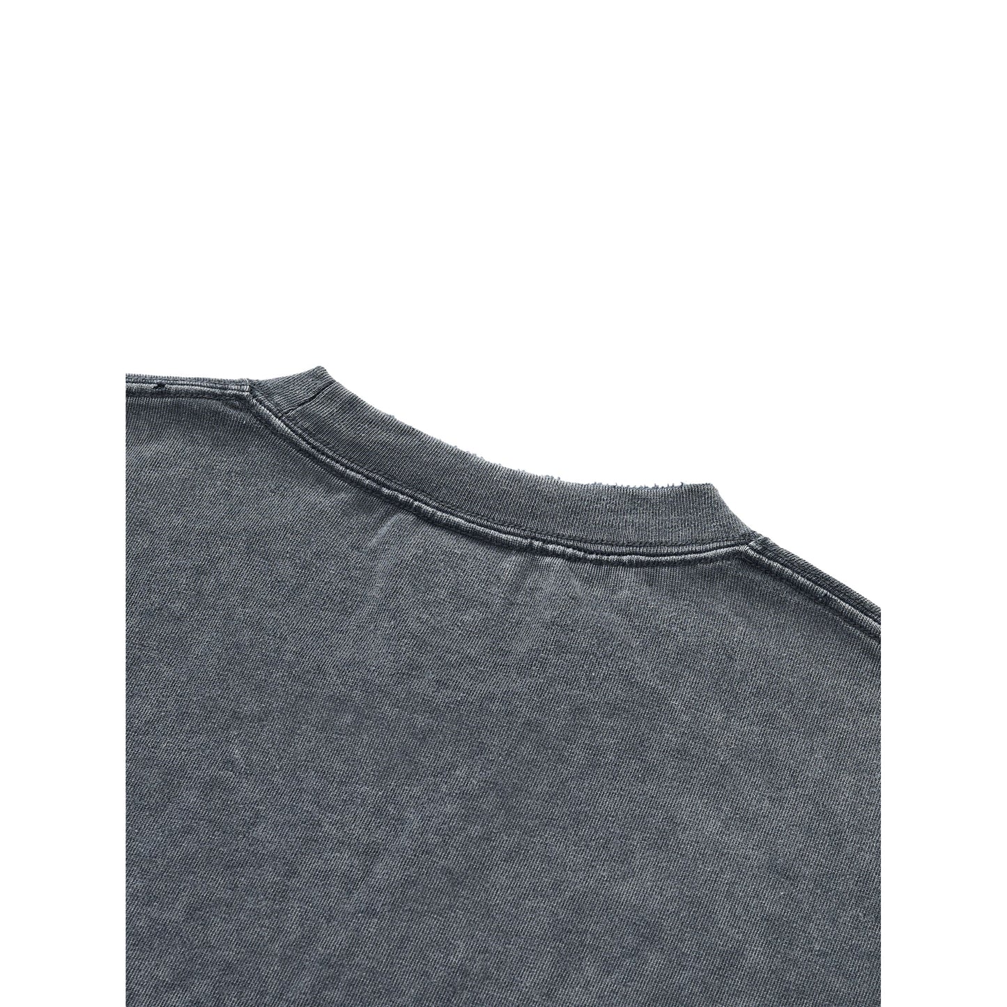 Close-up of a dark gray shirt collar on a white background