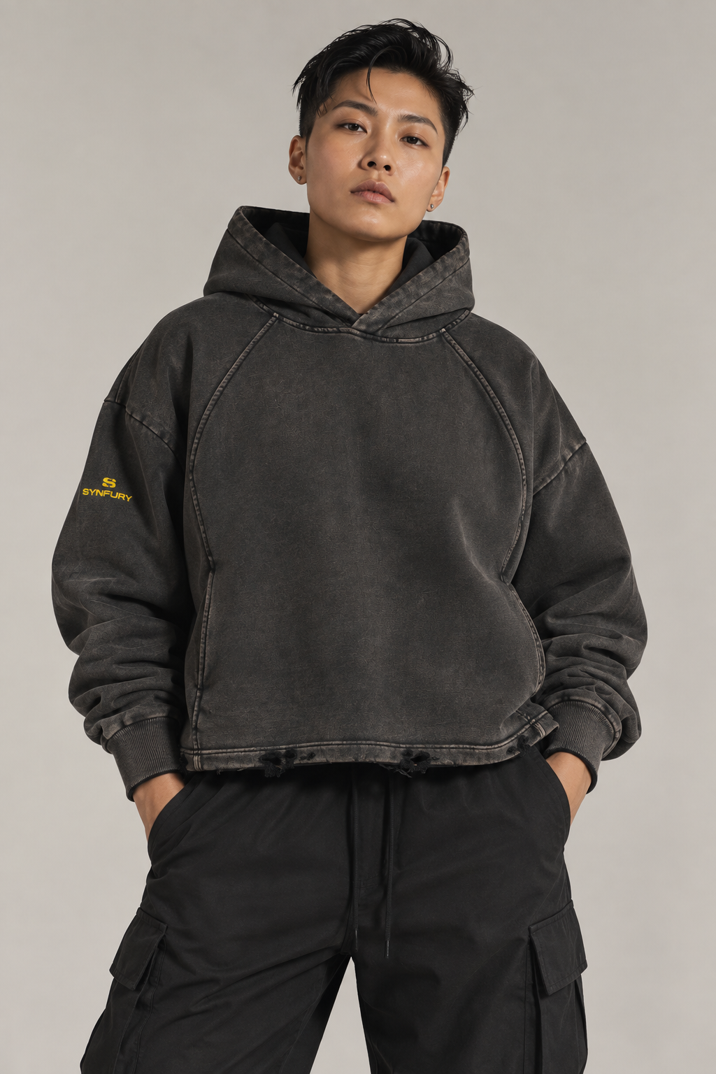 SYNFURY cropped hoodie in washed black, raw distressed hem