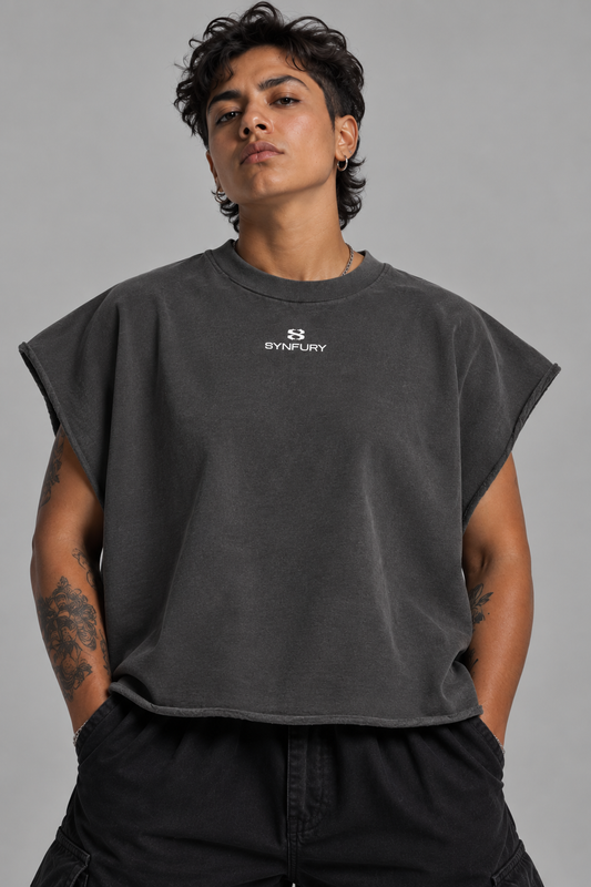 The Outlier cutoff tee with SYNFURY chest logo, oversized fit, paired with cargo pants