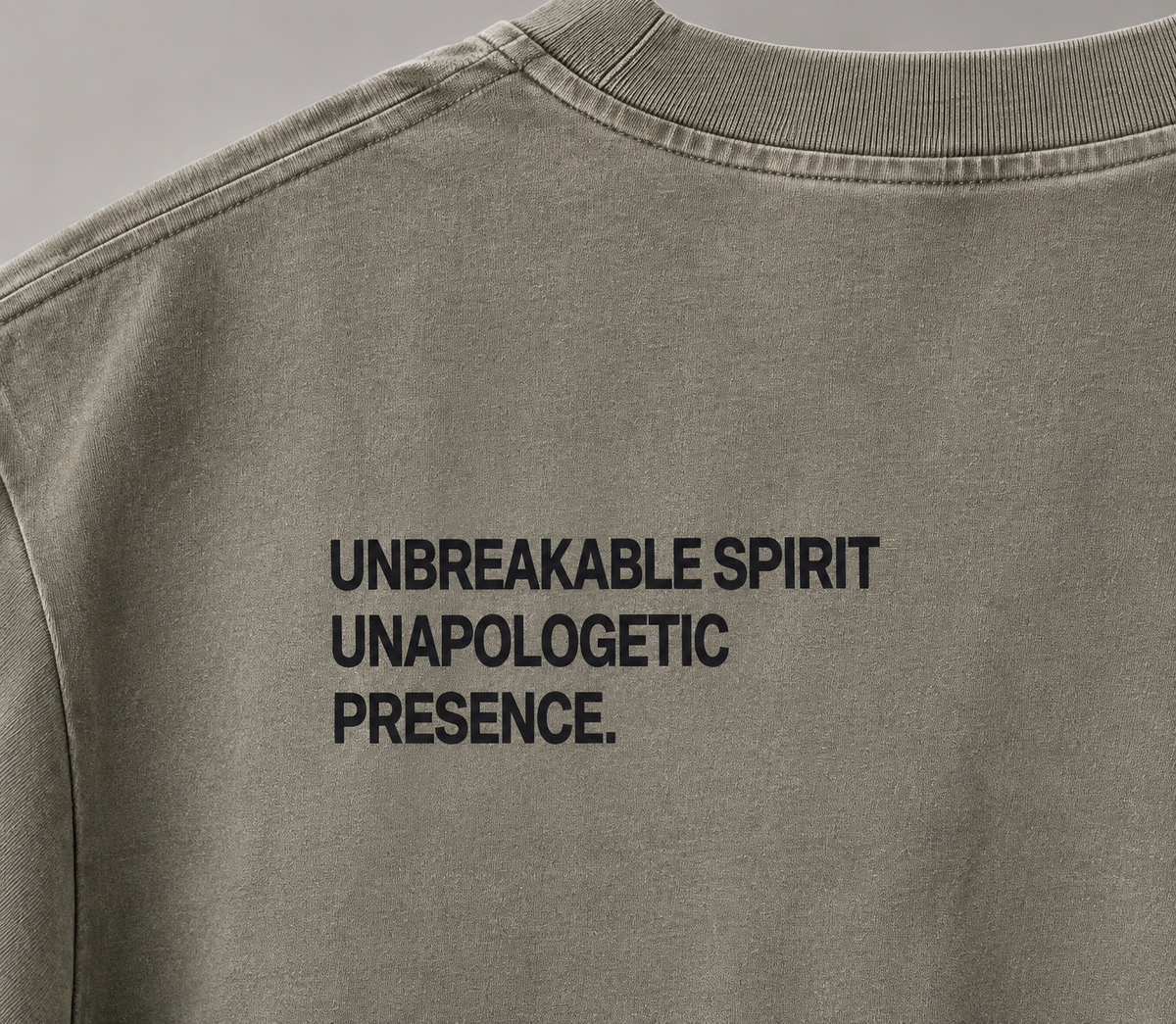 SYNFURY oversized tee in Vintage Clay, back print "Unbreakable Spirit, Unapologetic Presence