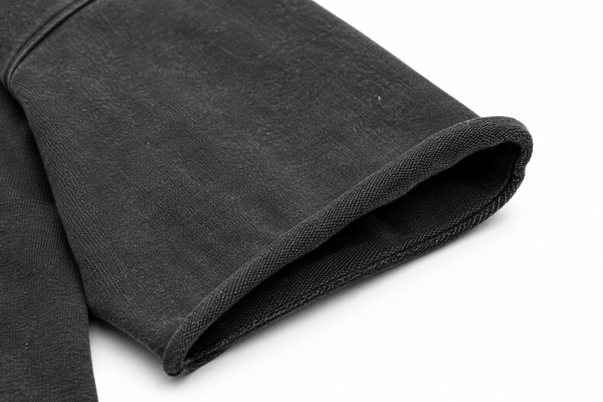Close-up of ribbed sleeve hem detail, heavyweight cotton