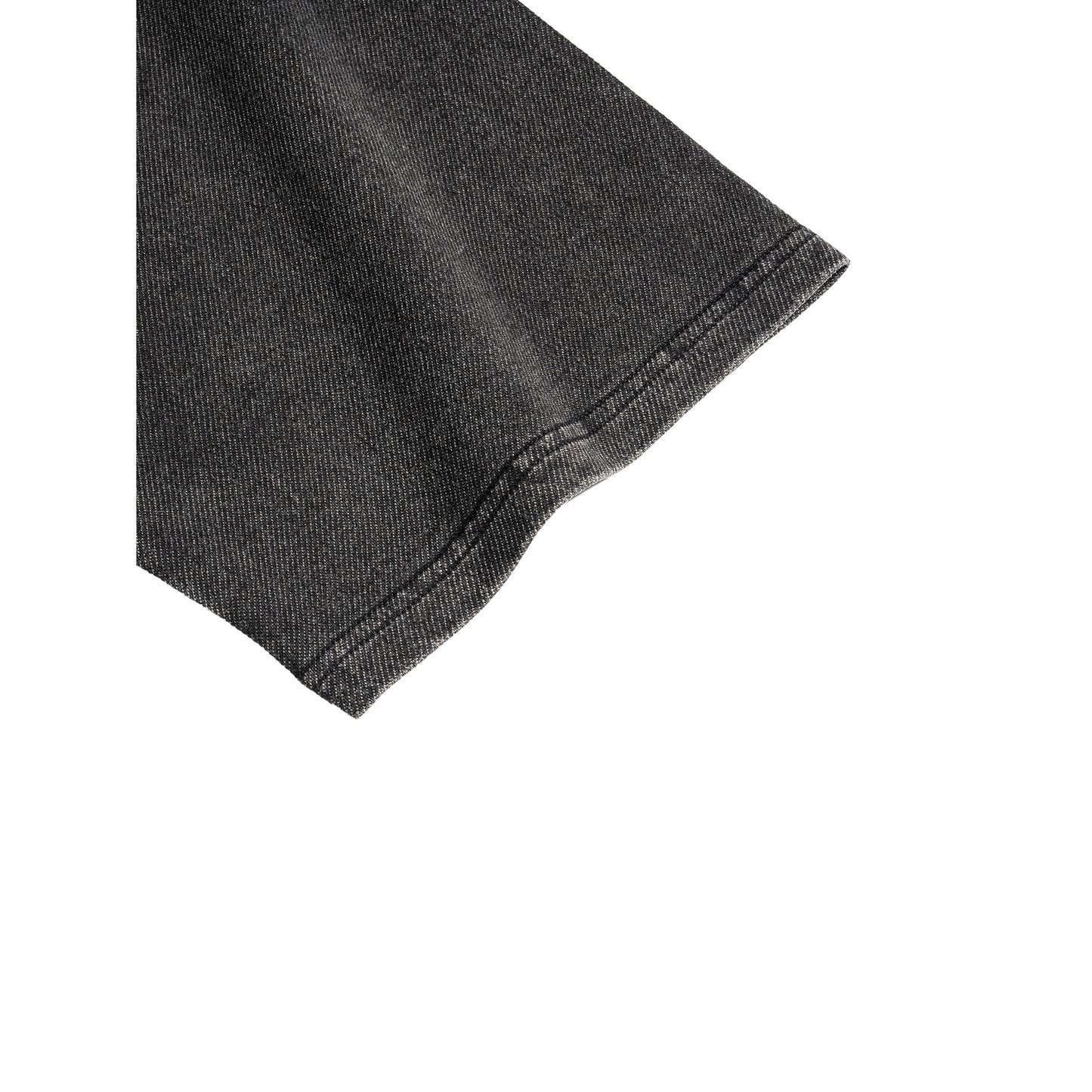 SYNFURY Close-up of a black denim fabric corner on a white background