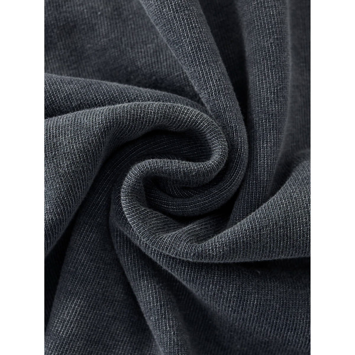 Close-up of dark gray fabric with folds